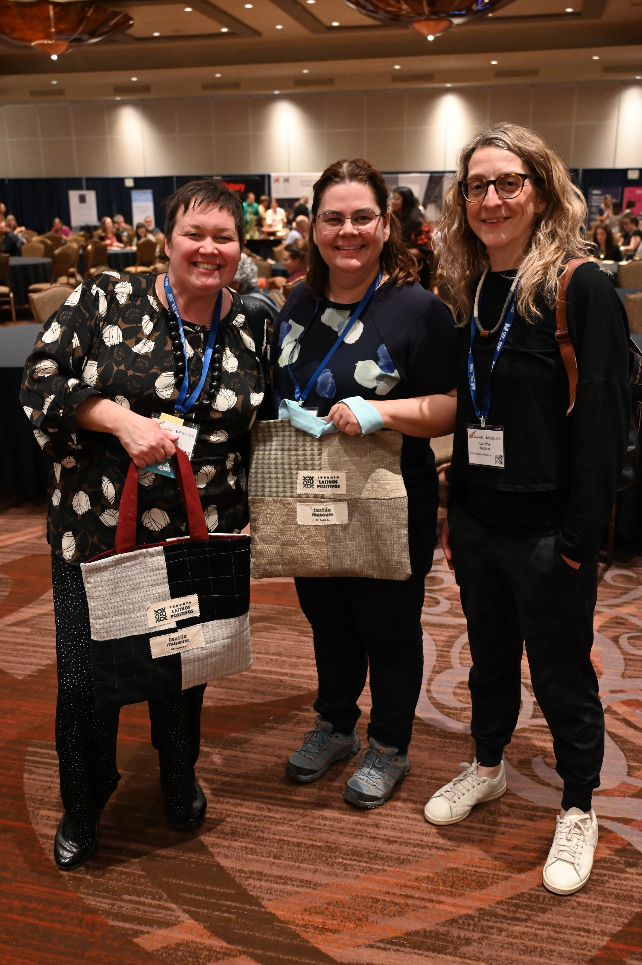 CMA National Conference 2024 delegates with tote bags.