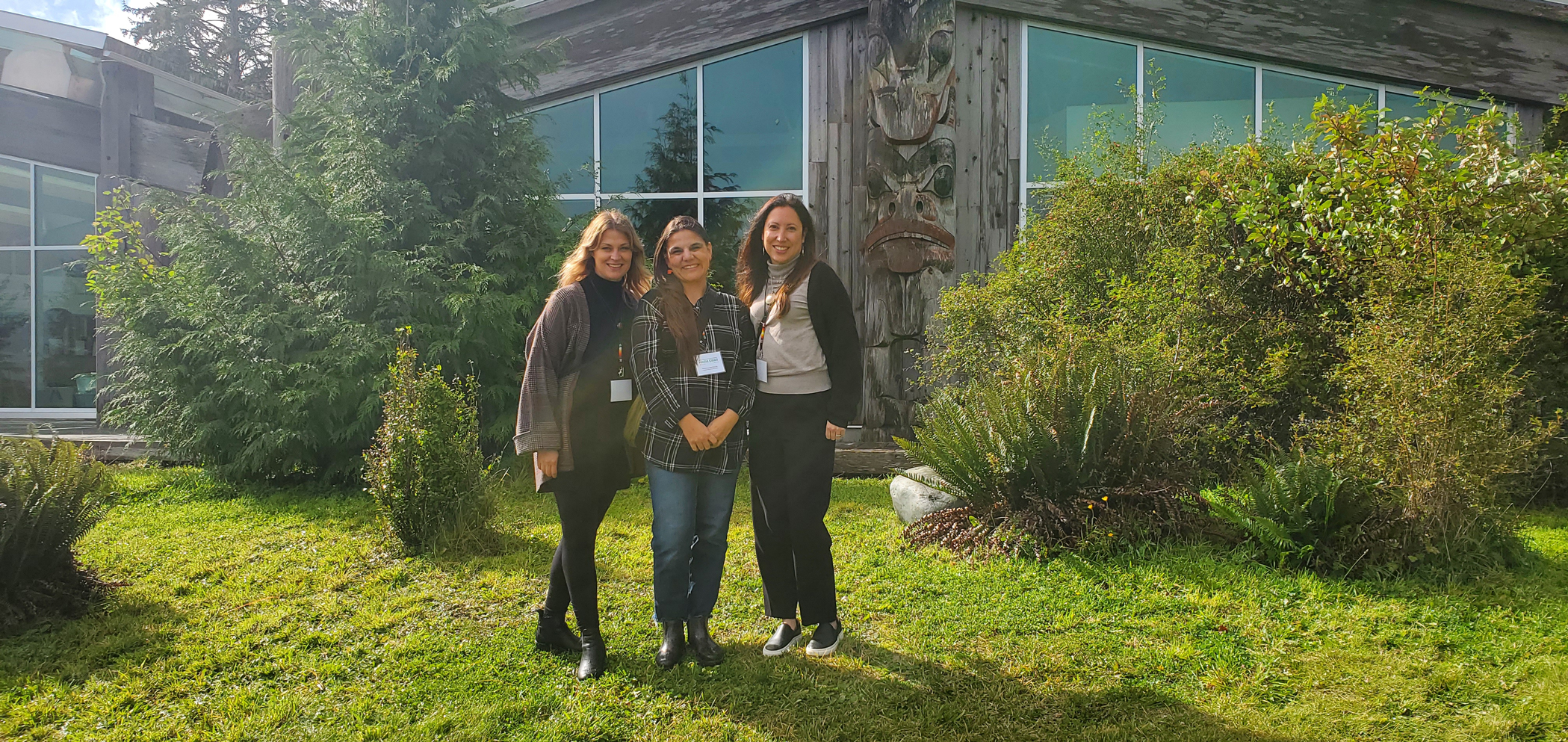 CMA Staff in front of Saahlinda Naay (Haida Gwaii Museum)