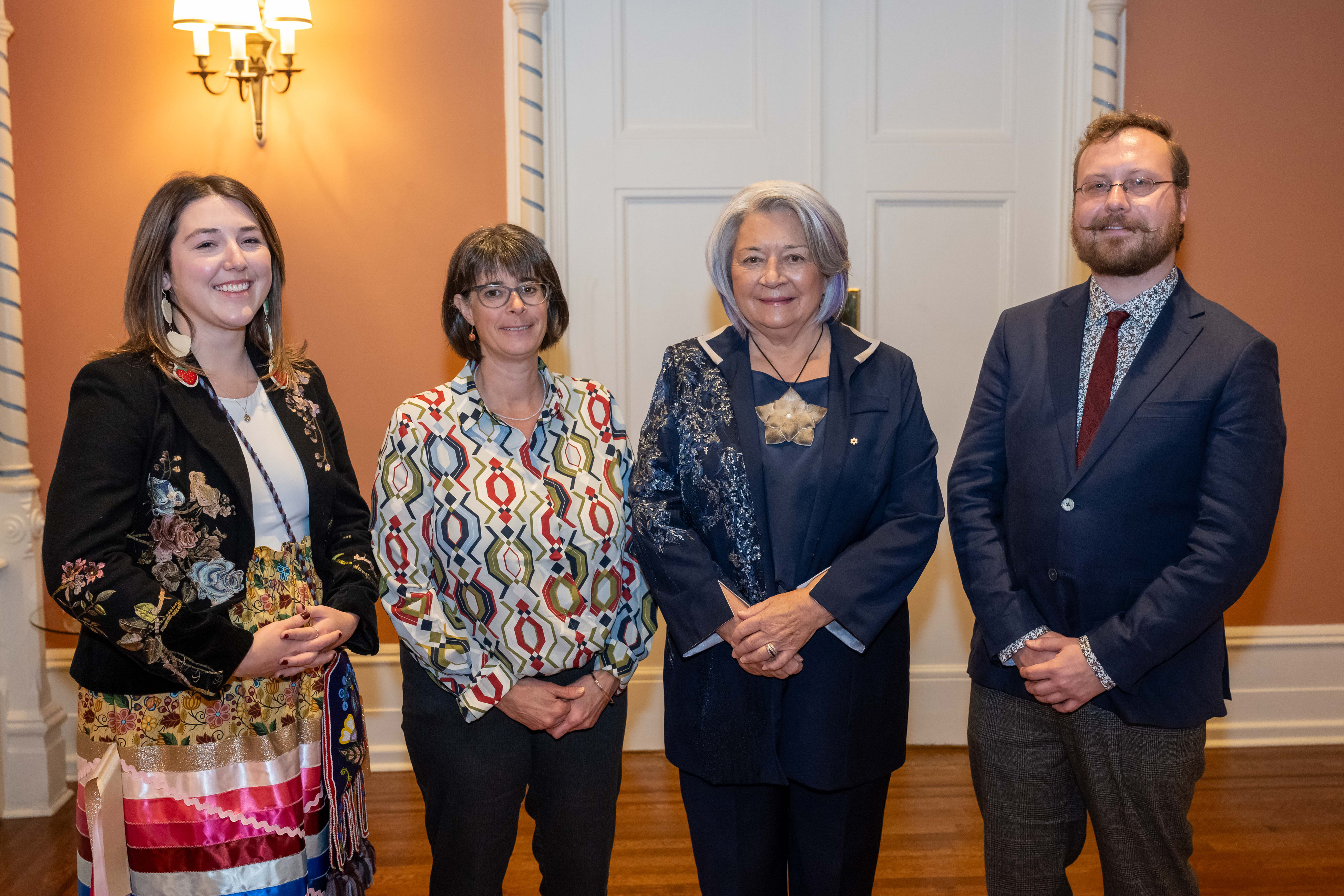 Award recipients Margaret Firlotte, Andrea Reichert and Eric Napier Strong pose with Her Excellency the Right Honourable Mary Simon